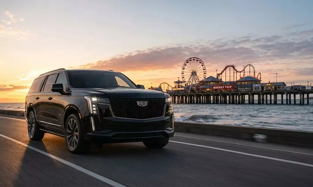 Luxury Black Cadillac Escalade SUV Driving along Waterfront Promenade Black Cadillac Escalade SUV driving on a coastal road past a pier boardwalk with a Ferris wheel and roller coaster — what to expect when booking a limo with reliable airport limousine.