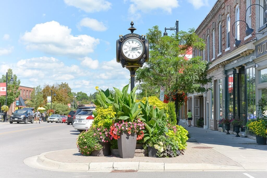 Downtown Oshawa street view with iconic clock and local attractions