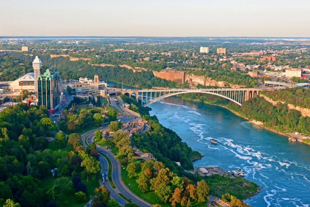 Aerial view of Niagara Parkway, Rainbow Bridge, and Niagara River in Niagara Falls